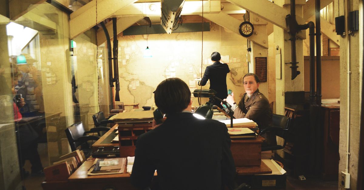 Vintage scene of officers working in a historic war room with maps and desks.