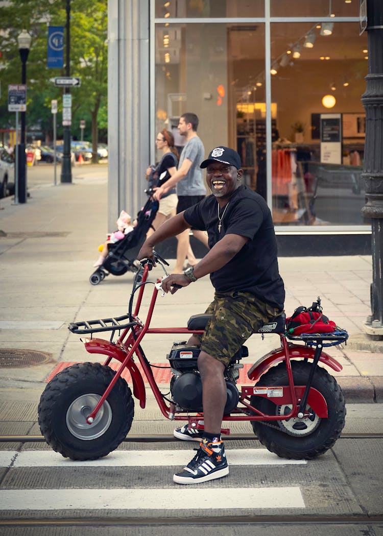 Smiling Man On Motorbike