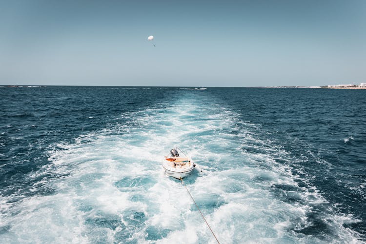 A Yacht Pulled Using A Rope On The Sea