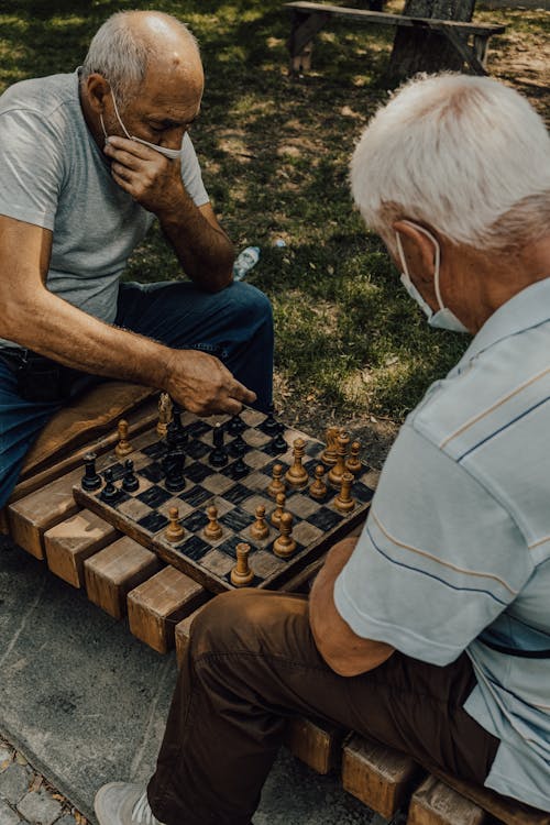 Elderly Men Playing Chess