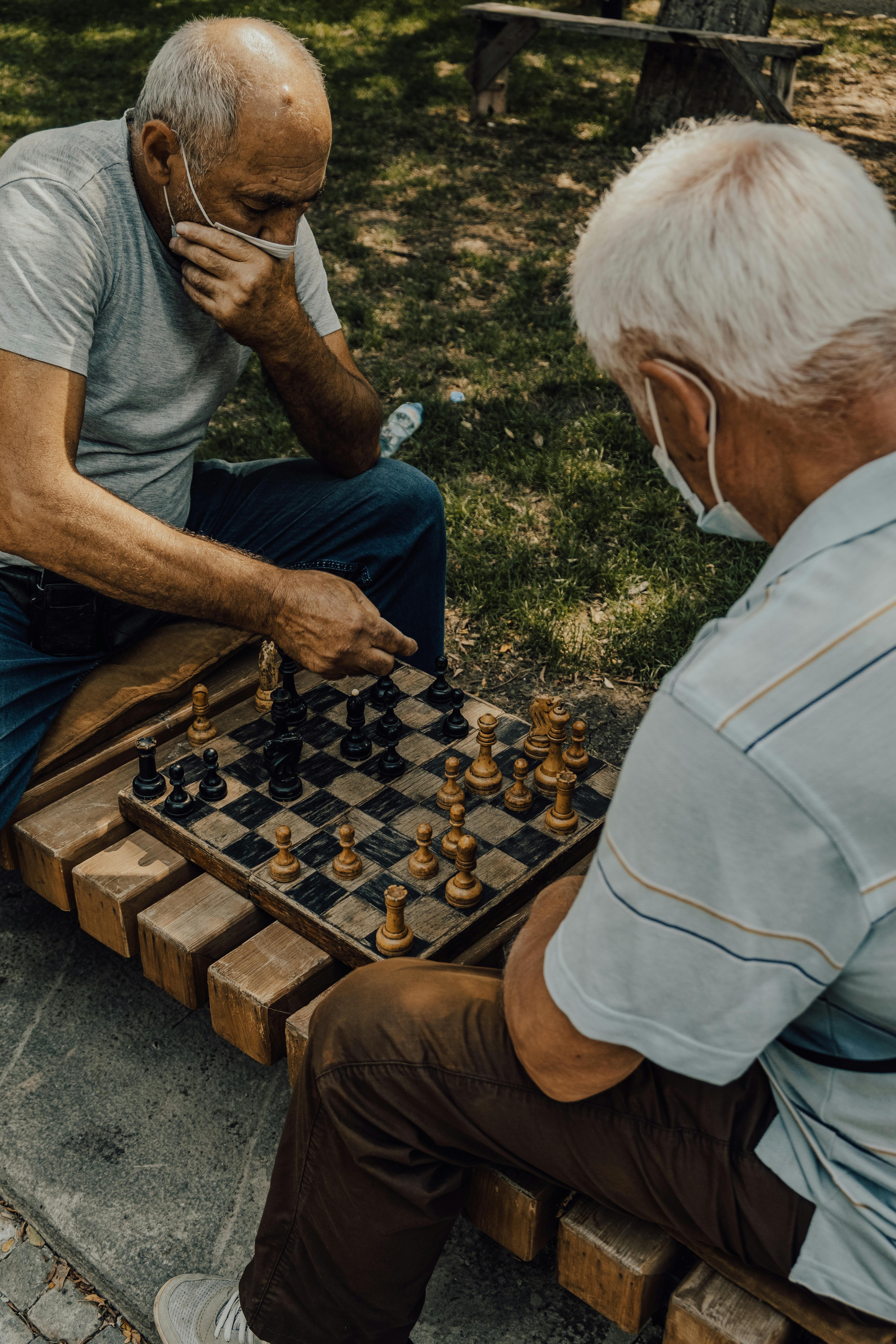 Old Man Playing Chess - Stock Photos