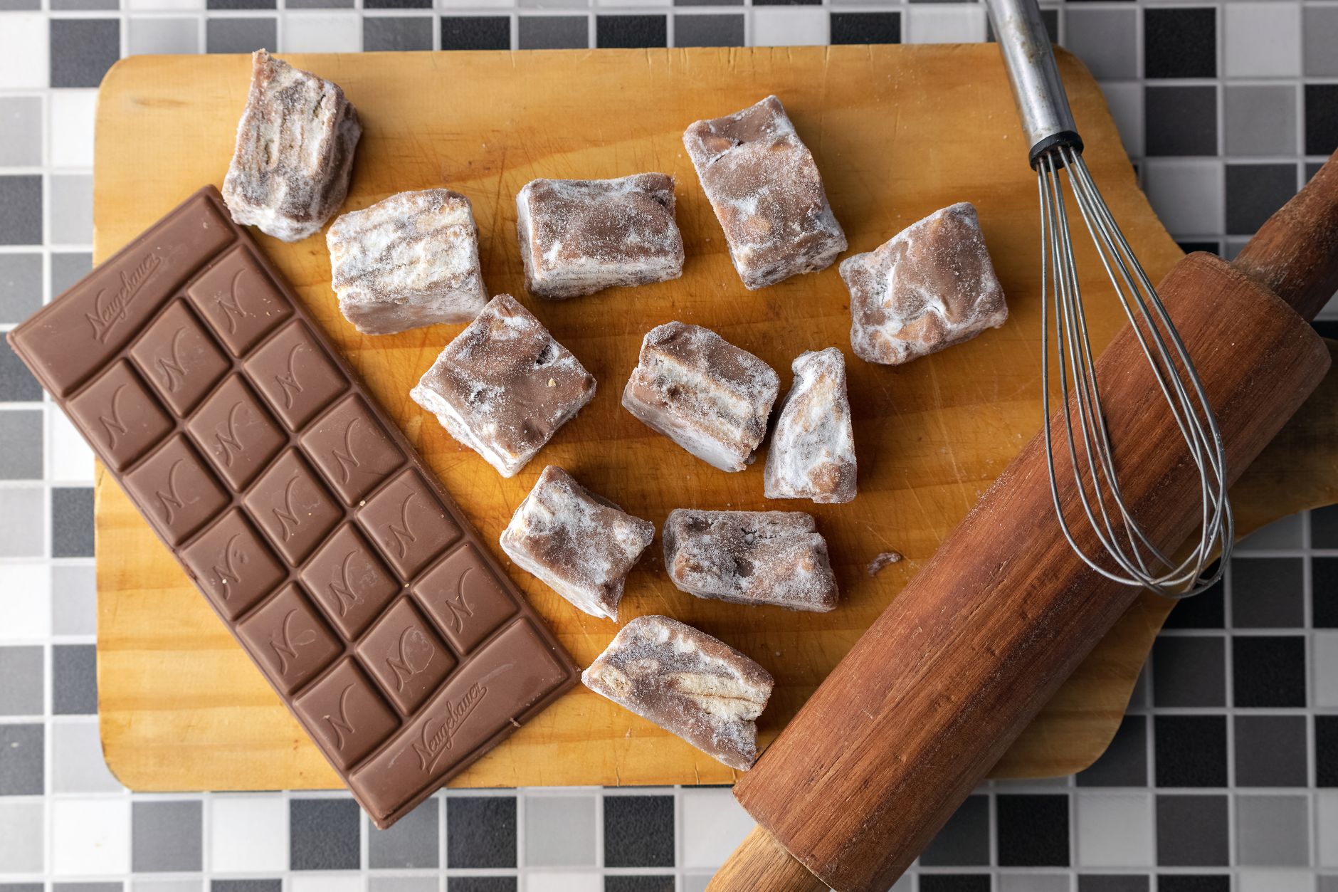 Malted milk fudge squares topped with malted milk balls