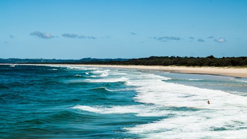 Free Blue Body of Water and White Sand Island Stock Photo