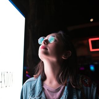 Portrait lit with coloured gels — photo by Studio 31 on Pexels