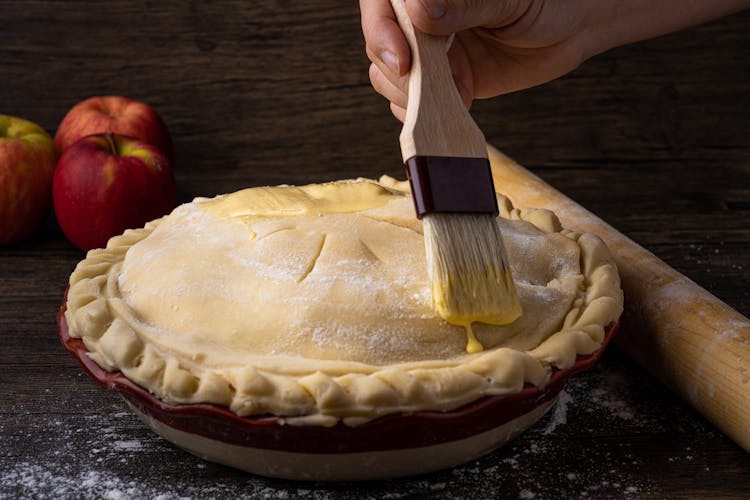 Brushing Egg Wash On A Pie