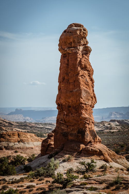 Brown Rock Formation Under the Blue Sky