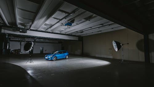 Blue Honda Civic inside a Warehouse
