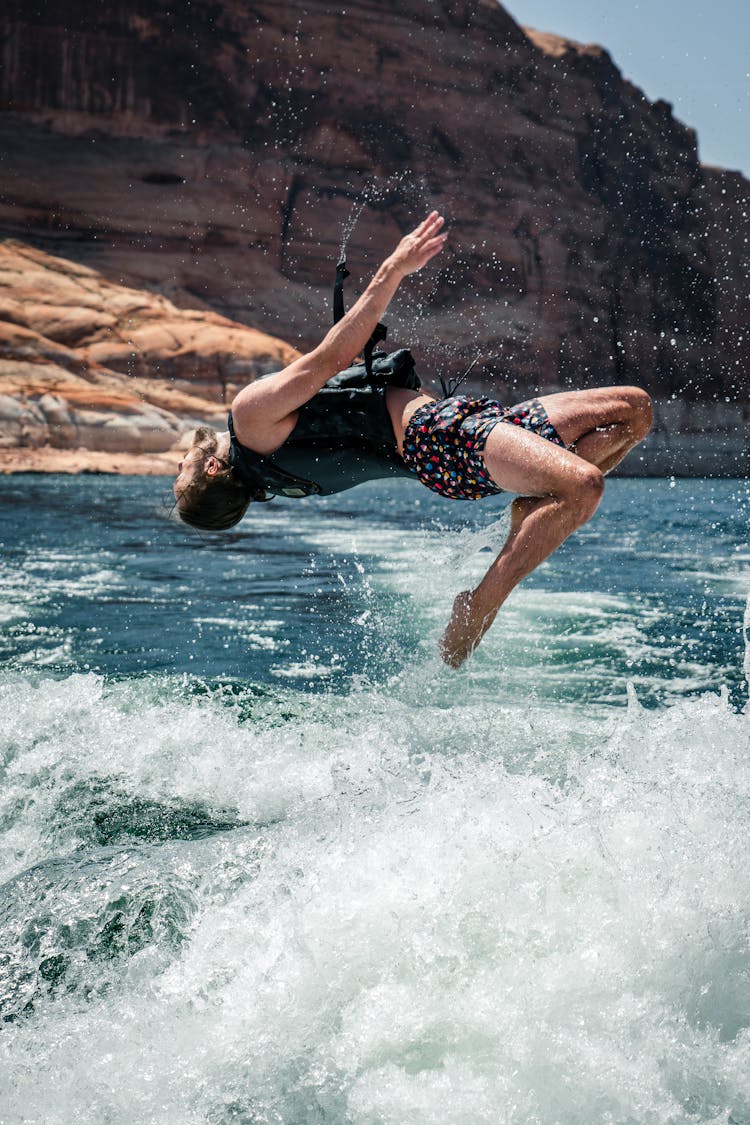 Man Jumping In Water