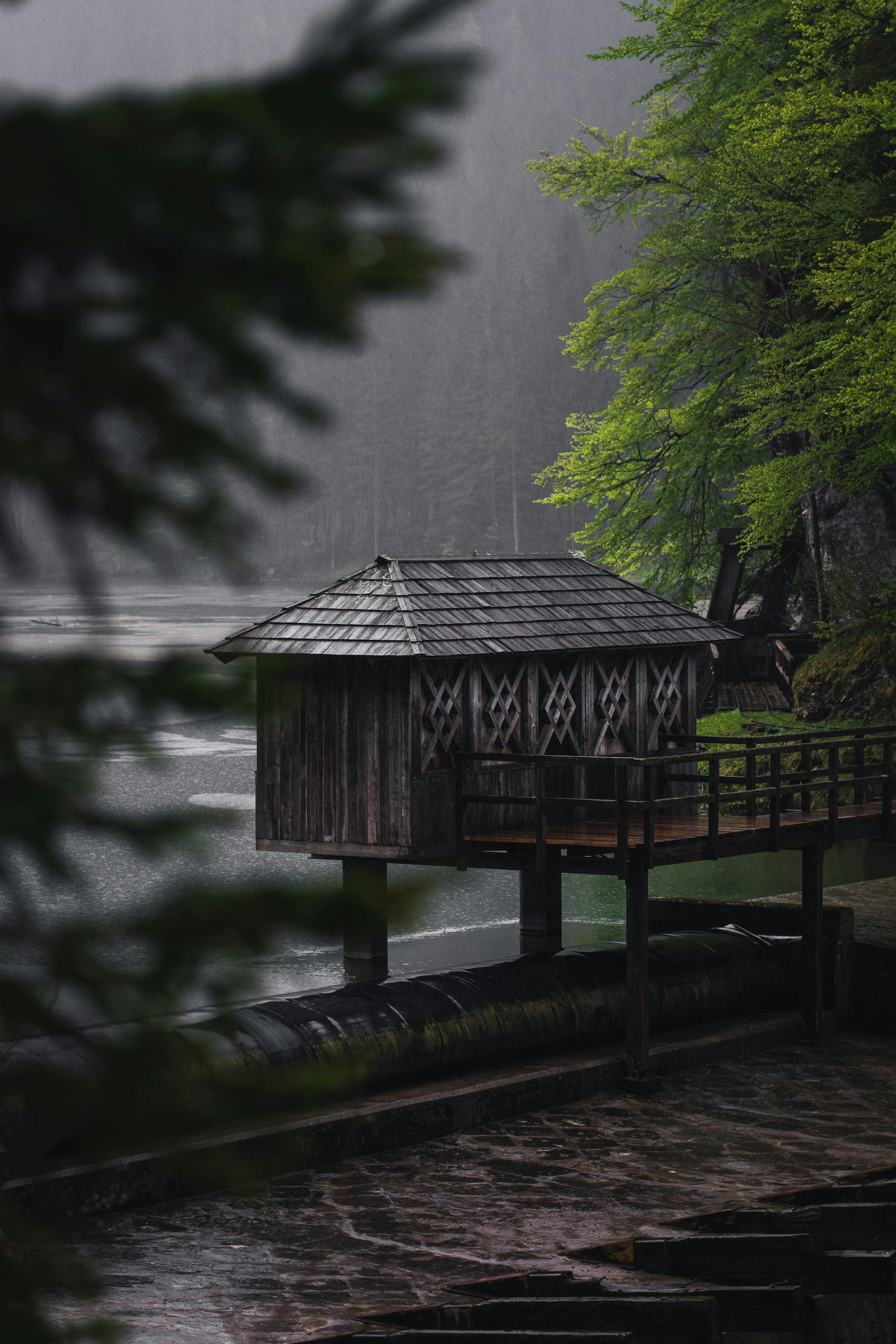 Hut on River on Rainy Day · Free Stock Photo