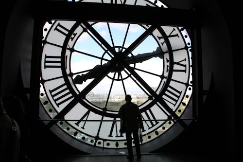Free A Man Standing Near the Clock Tower Stock Photo