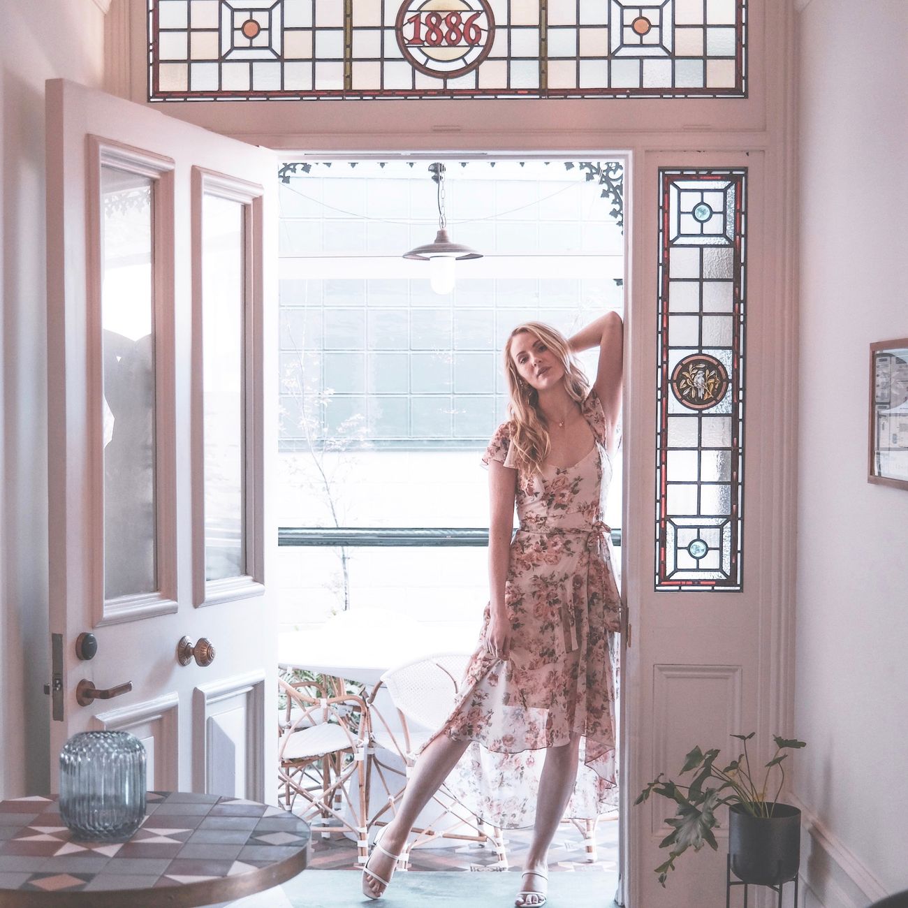 Elegant portrait of a woman posing in a beautiful Cammeray doorway, exuding grace and style.