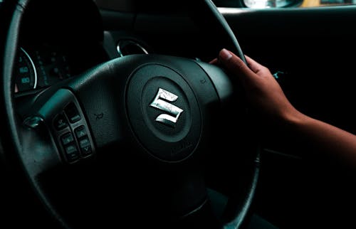 Free Black Suzuki Steering Wheel
 Stock Photo