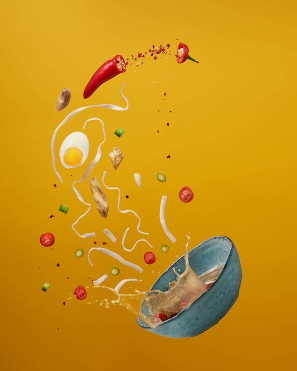 An Animation of Spilled Soup on a Yellow Background