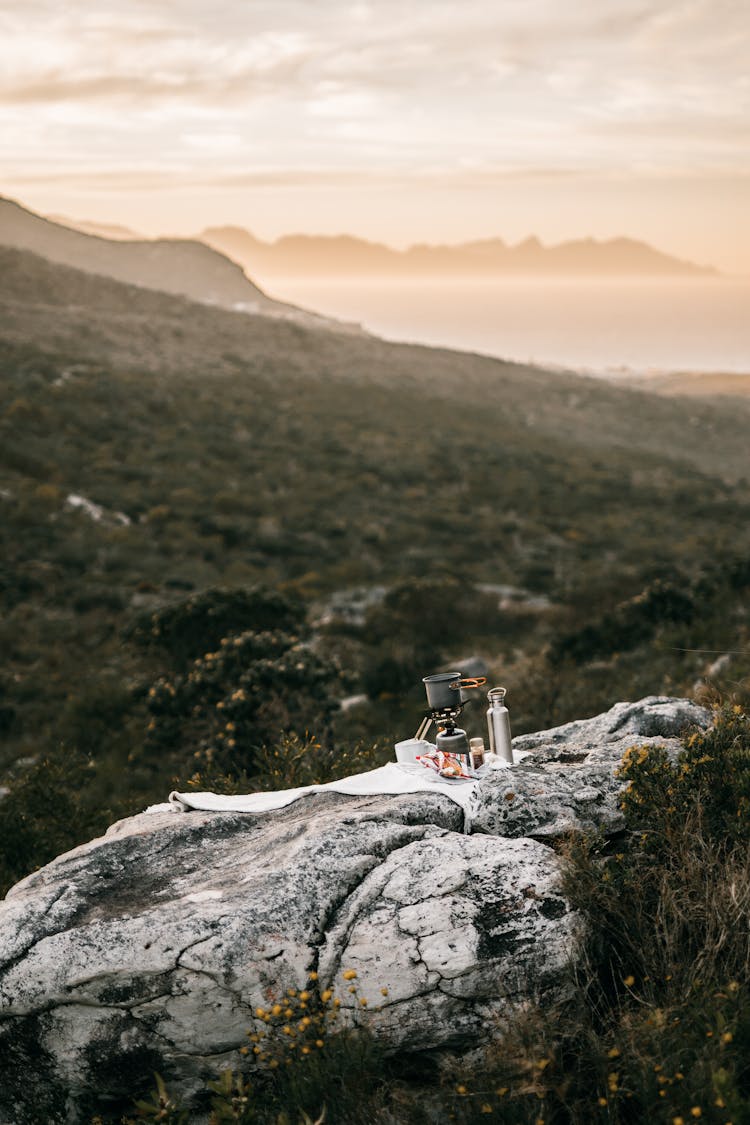 Outdoor Cooking Tools On A Cliff Of A Mountain