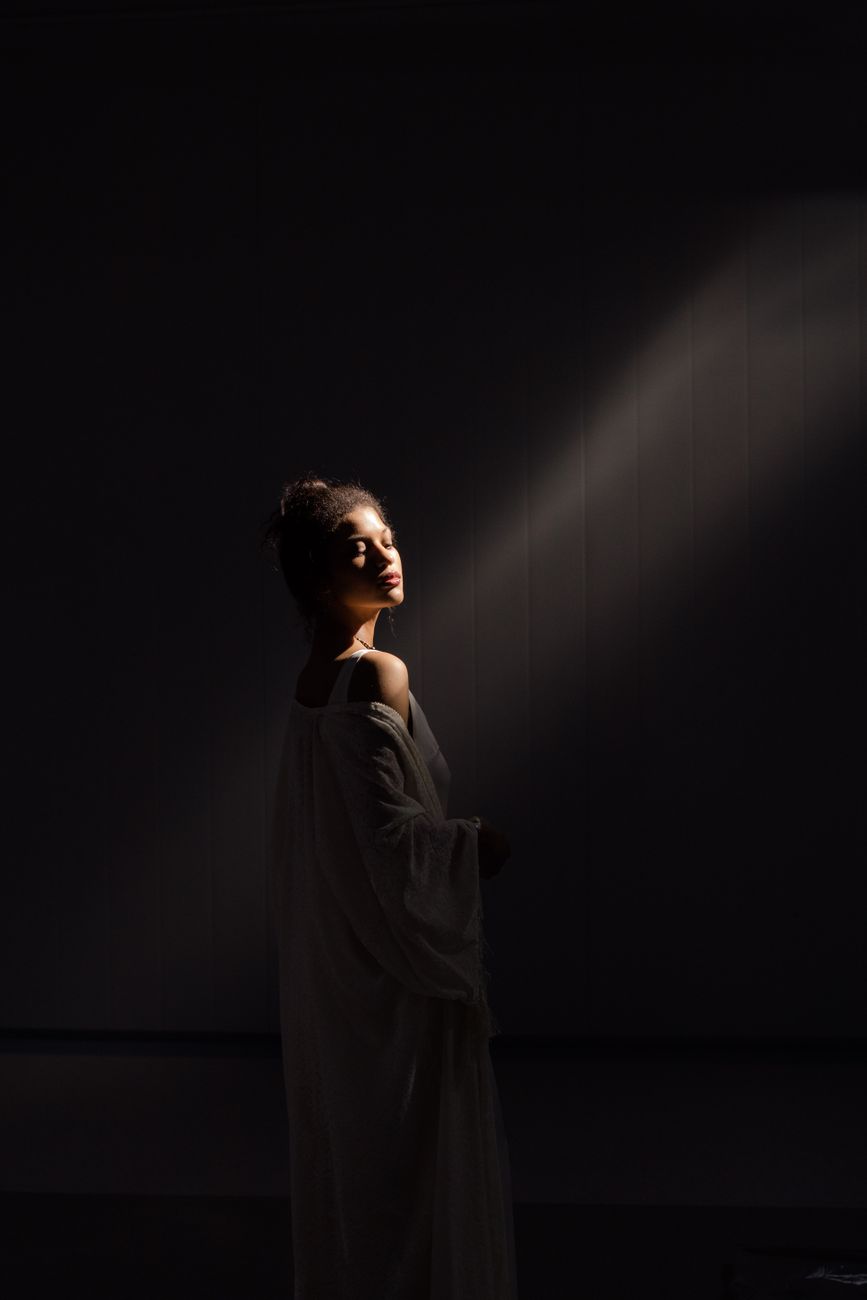 An ivory silhouette in a sculptural, light-filled space