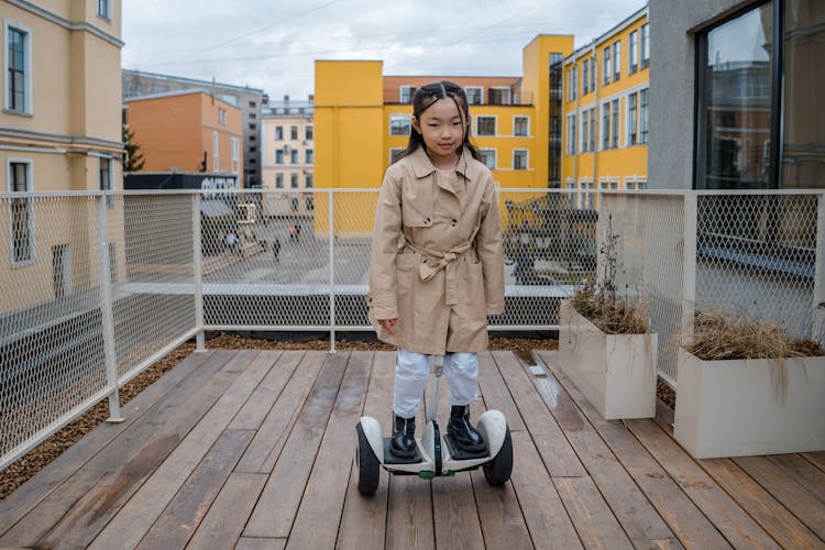 A Girl Riding A Hoverboard