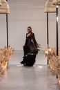 Woman in Black Dress  Walking on Gray Tile Flooring
