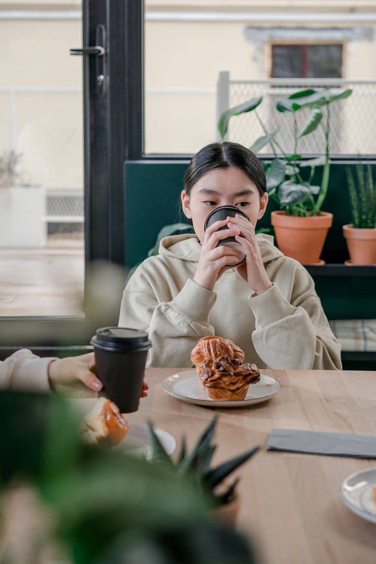 A Woman Drinking Coffee 