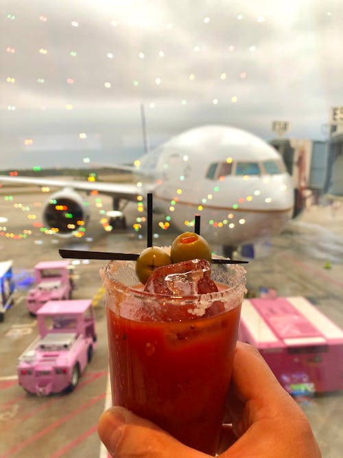 Free stock photo of airport gate, alcoholic drink, bloody mary Stock Photo