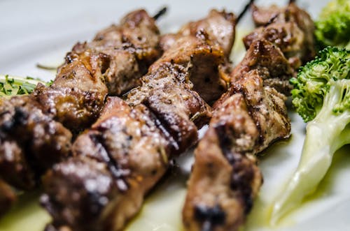 Free Close-Up Photo of Grilled Skewered Meat Stock Photo