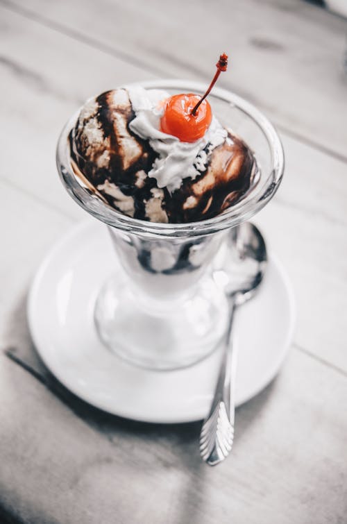 Photograph of an Ice Cream with Cherry on Top