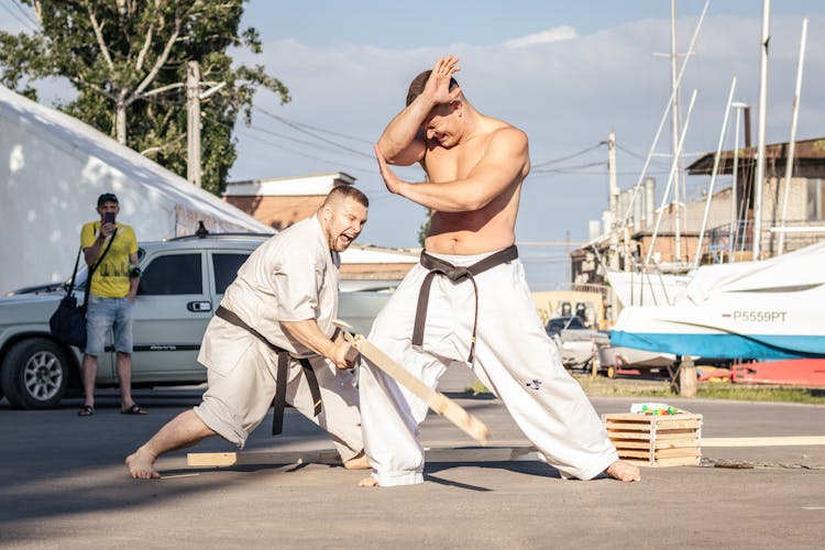 Men Doing A Karate Street Performance 