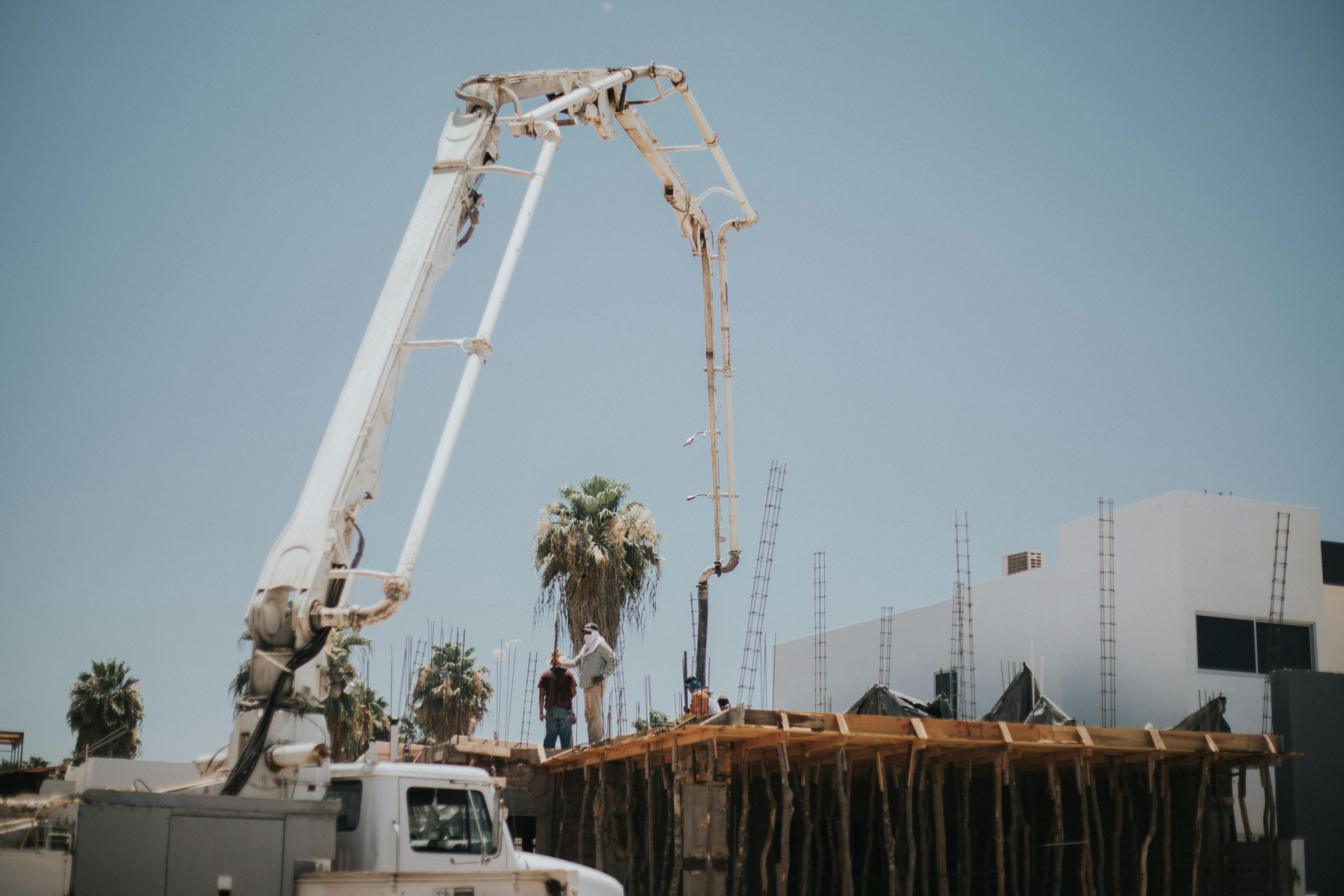 white crane in a construction site