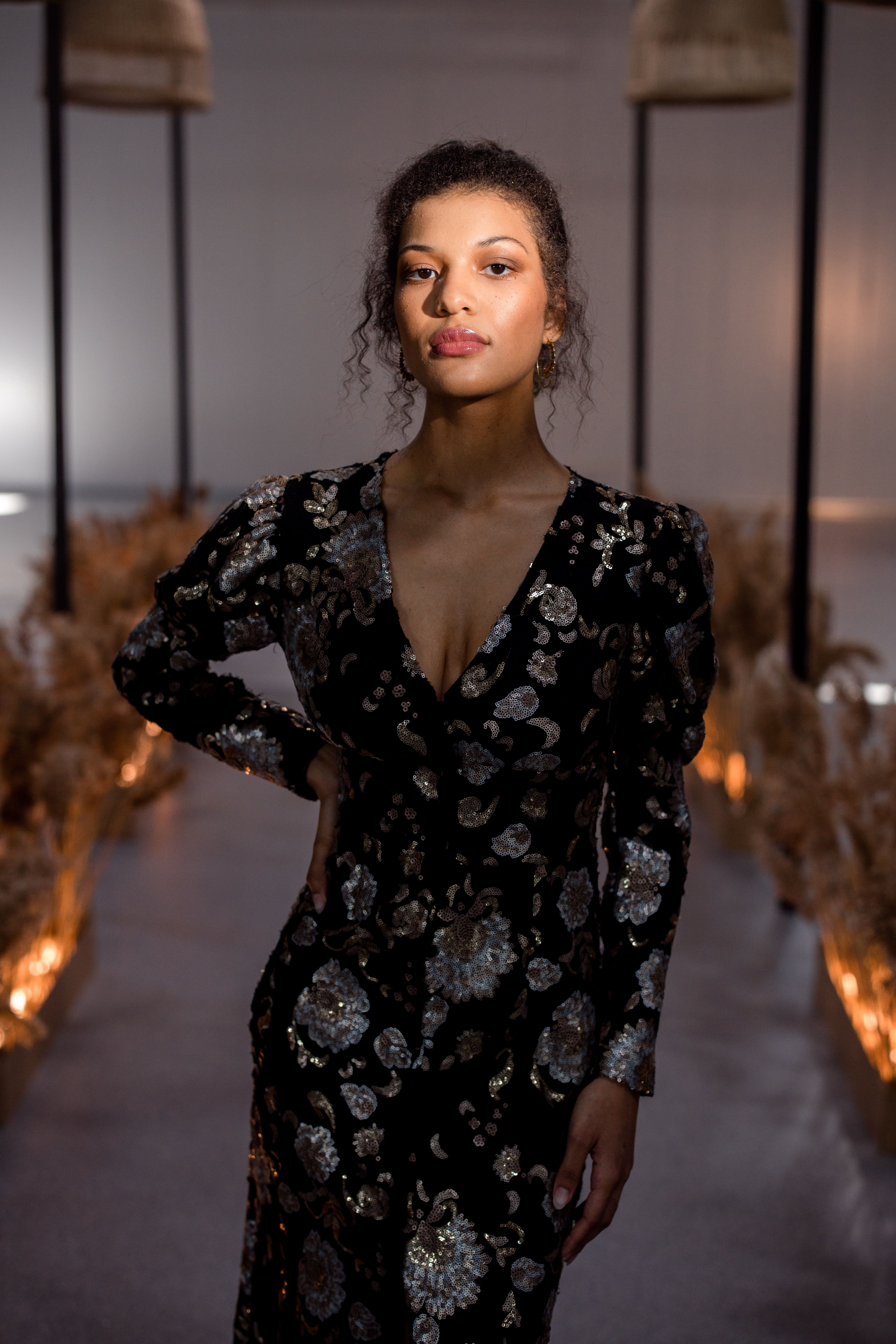 Young Woman in a Floral Dress · Free Stock Photo