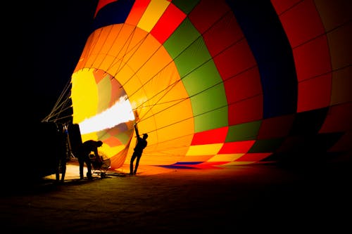 bezplatná Základová fotografie zdarma na téma horkovzdušný balón, lidé, oheň Základová fotografie