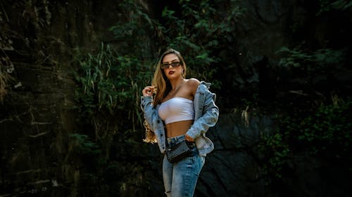 A Woman Wearing Sunglasses and Denim jacket