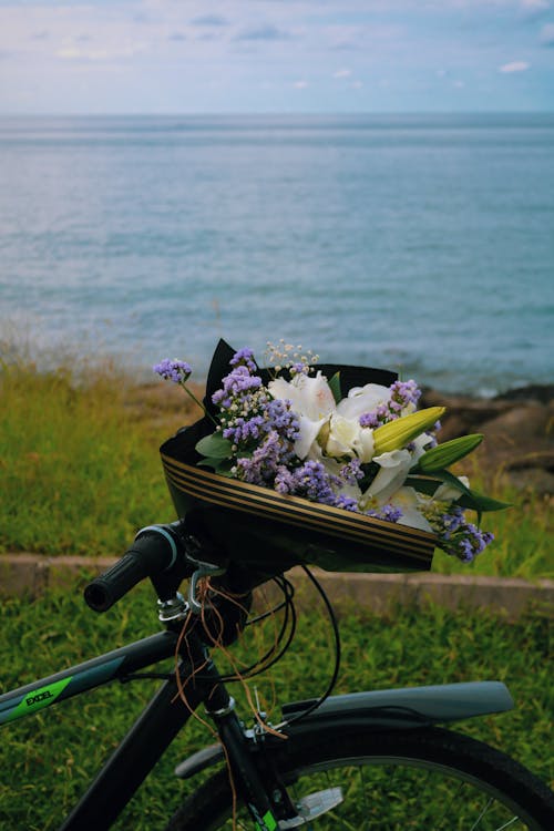 A Bouquet of Flowers Tied on a Bike