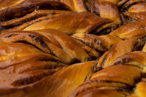 Free Delicious cinnamon swirls fresh out of the oven. Perfect for a sweet breakfast or treat. Stock Photo