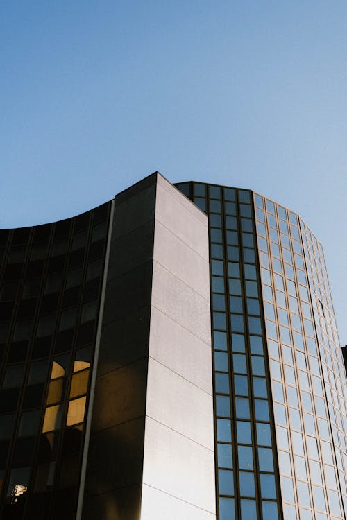 Gray Concrete Building Under Blue Sky