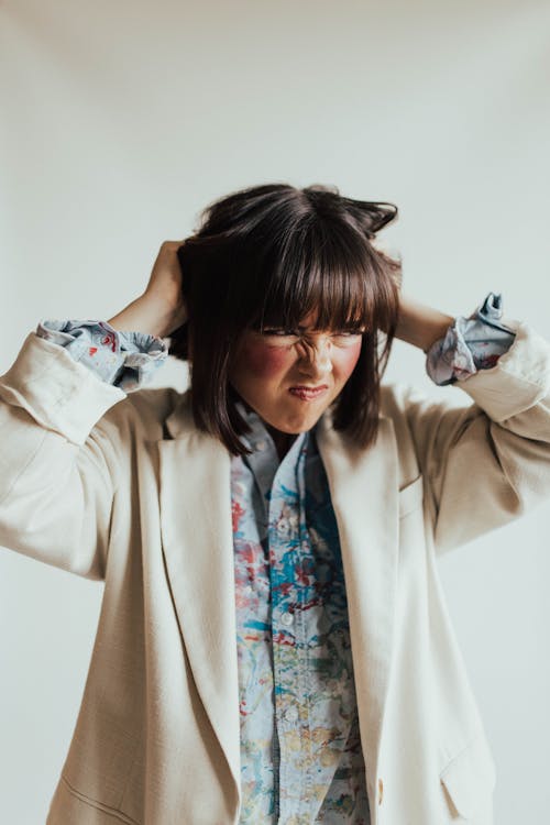 Free Angry Woman Holding Her Hair Short Hair  Stock Photo