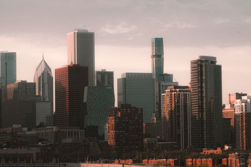 Free A stunning view of Chicago's skyline at sunset, showcasing iconic skyscrapers and urban architecture. Stock Photo