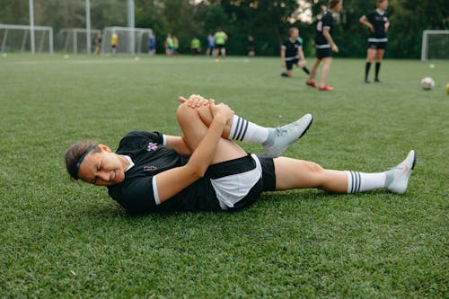 Injured Athlete Lying on a Soccer Field