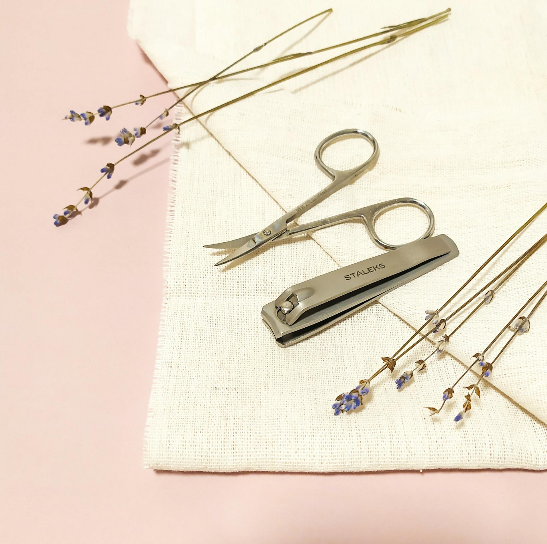 Nail Cutter and Scissor on the Table