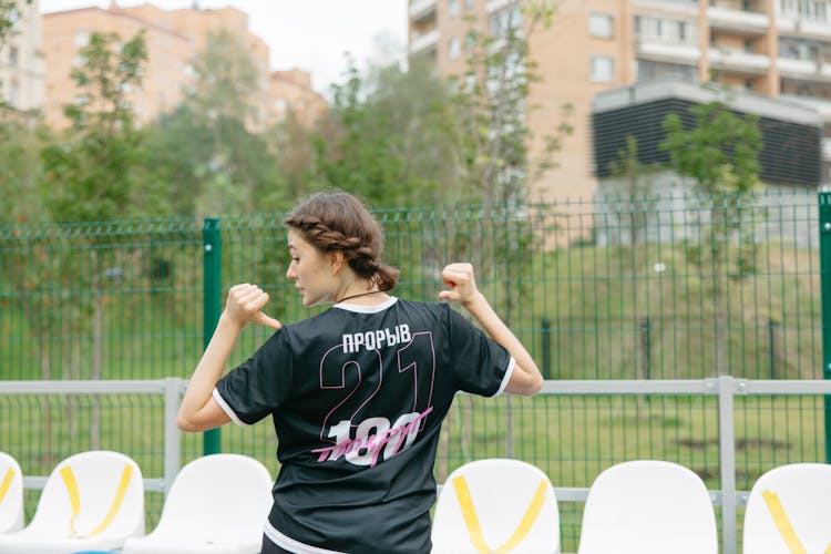 A Woman In Black Jersey