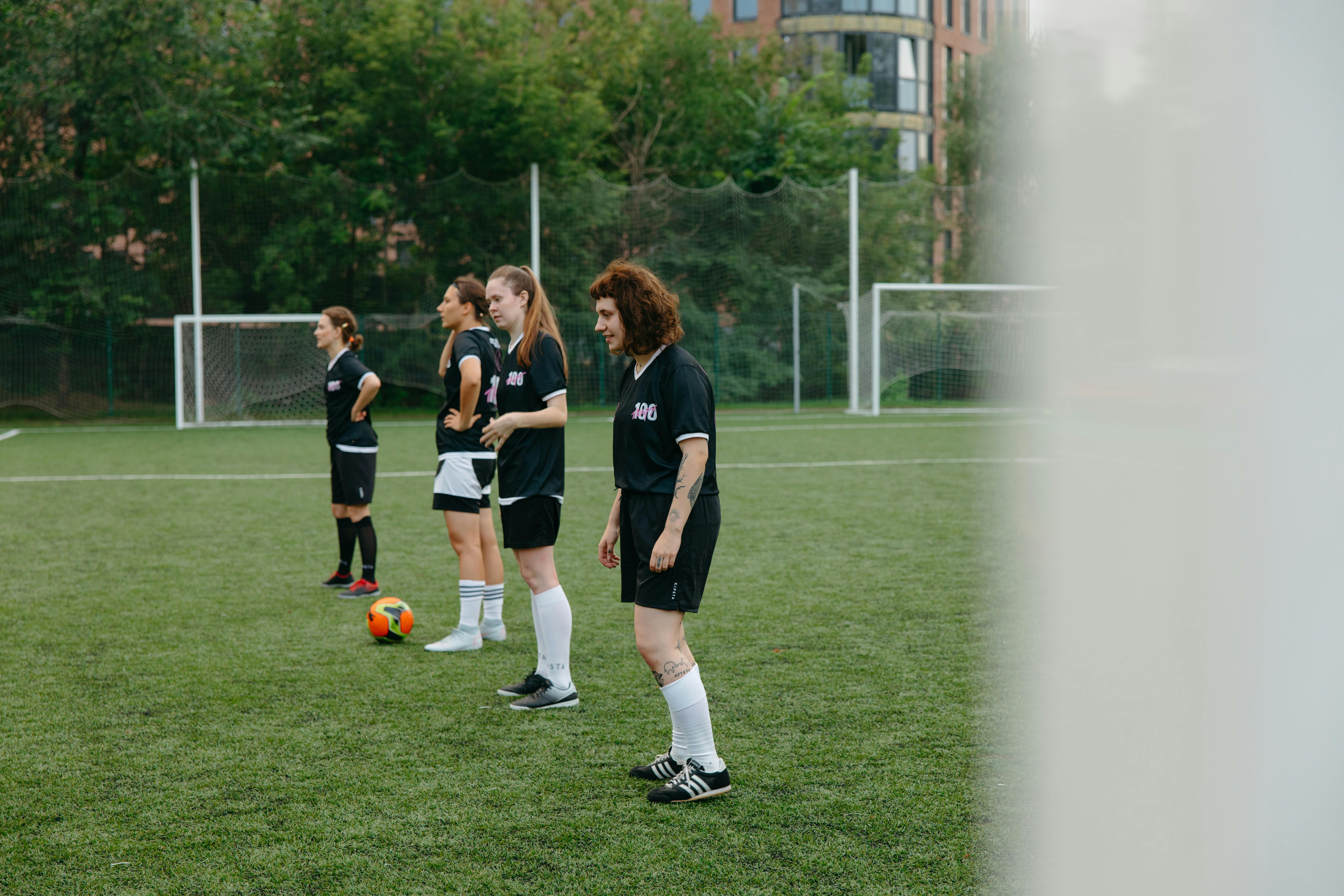 athletes playing soccer