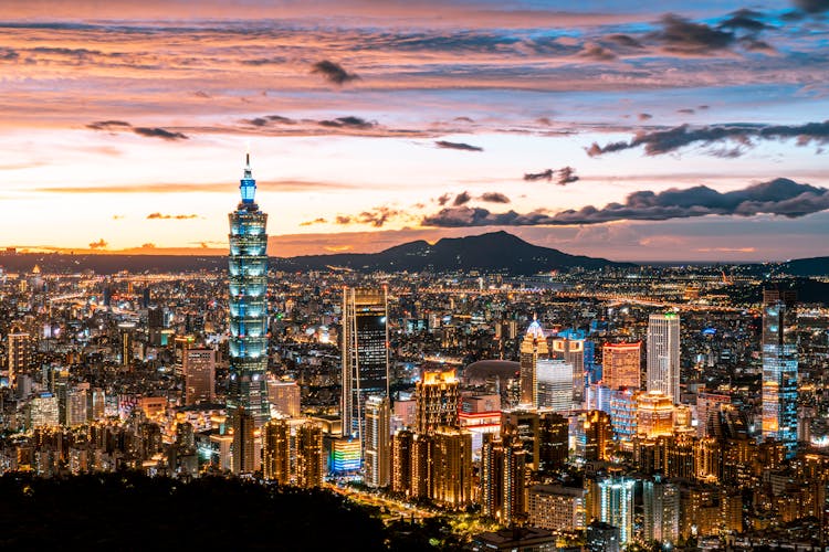 Panoramic View Of Big City At Sunset