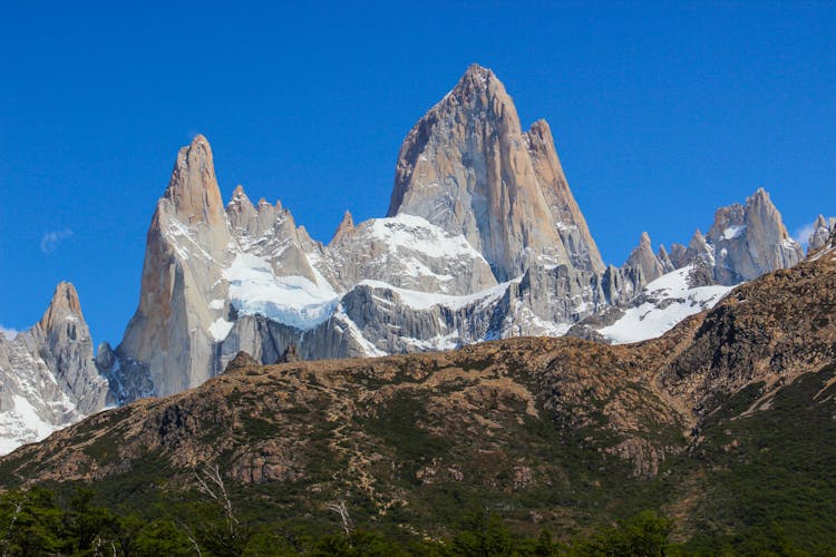 Snow Covered Fitz Roy Mountains Under In Patagonia