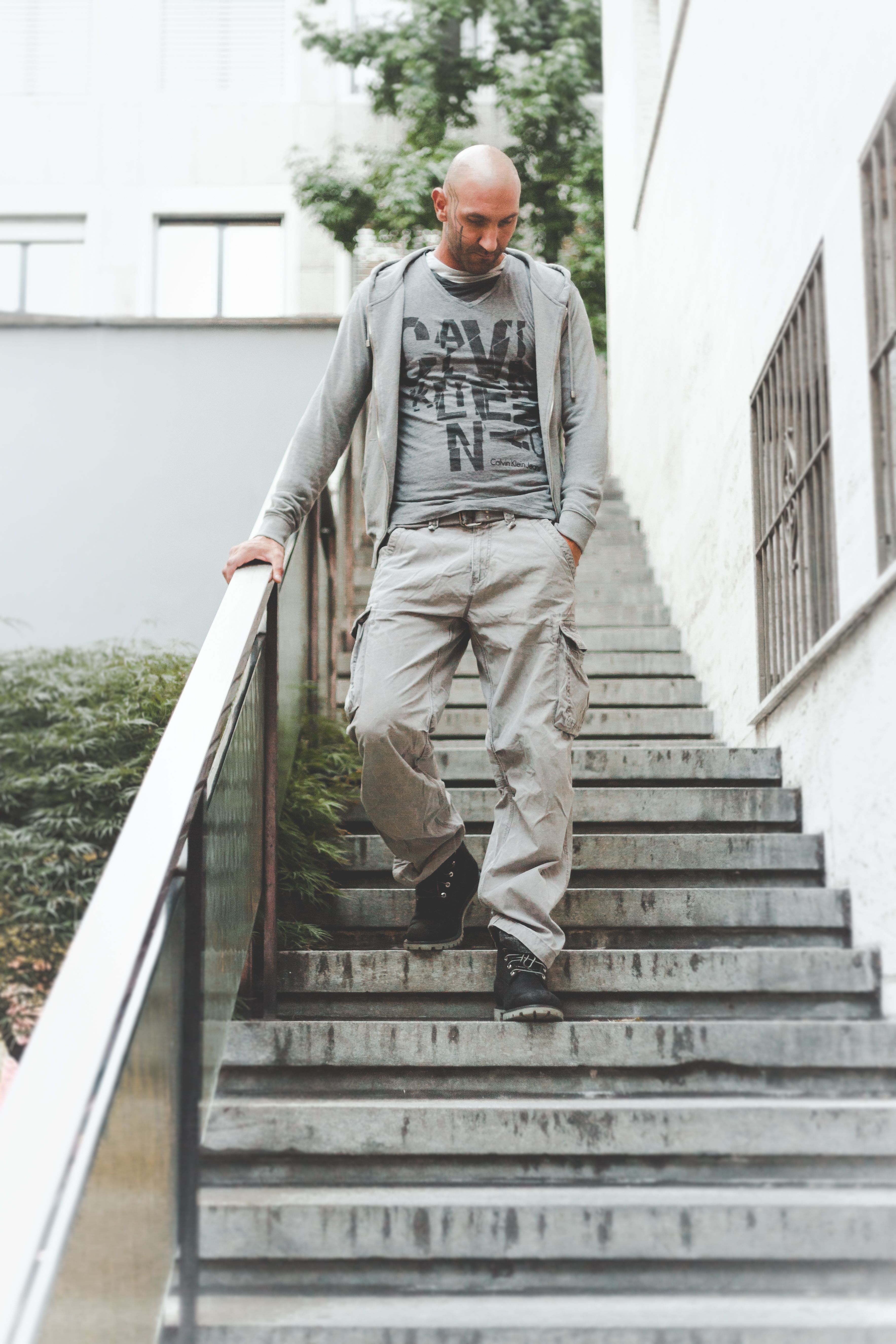 Man Walking Down The Stairs Free Stock Photo