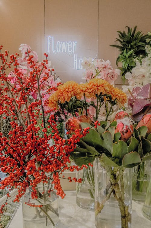 Assorted Flowers in Glass Vases