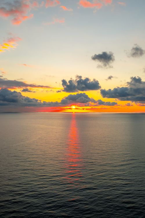 Free Captivating sunset over the Black Sea in Hopa, Turkey, with vibrant colors reflecting on calm water. Stock Photo