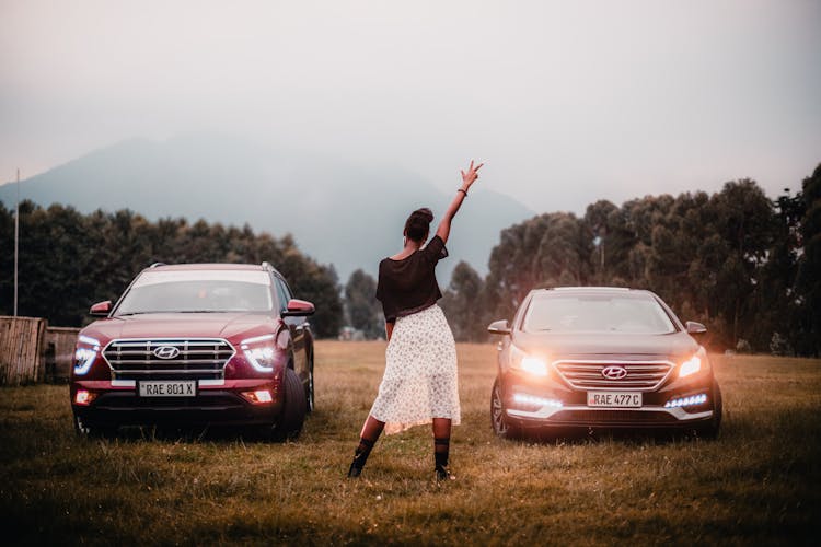 Woman And Cars At Race