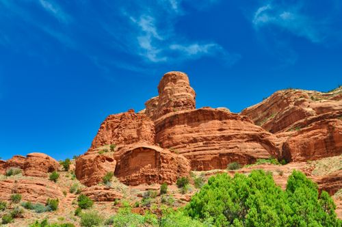 Free Breathtaking view of red sandstone formations under a vibrant blue sky in Sedona, Arizona. Stock Photo