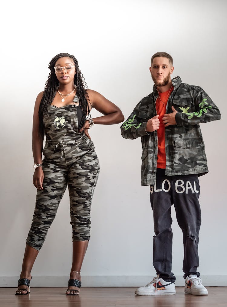 Man And Woman Fashion Models Posing In Moro Clothing