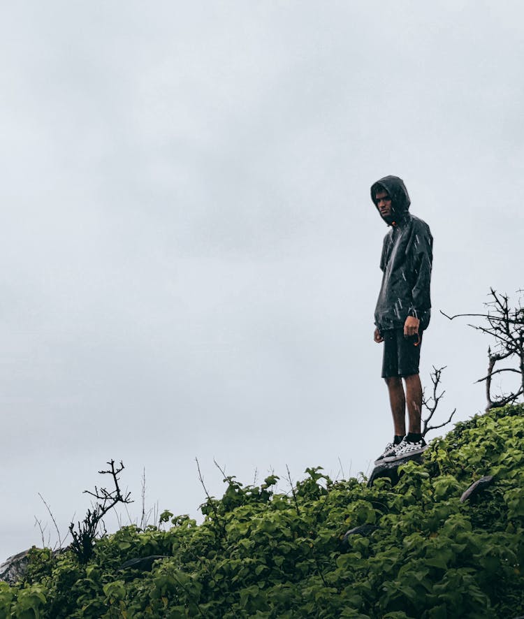 Clouds Over Man With Jacket With Hood