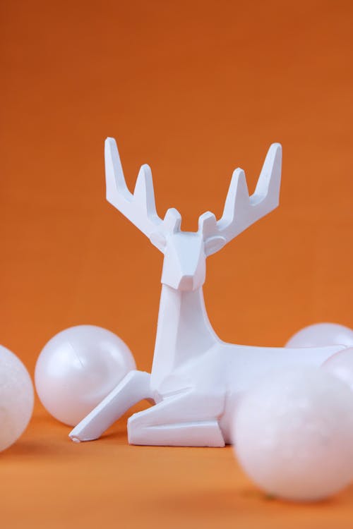 A Reindeer and Balls Ornaments Made of Styrofoam