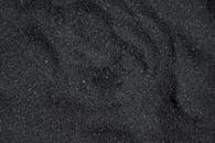 Close Up Photo of Black Sand